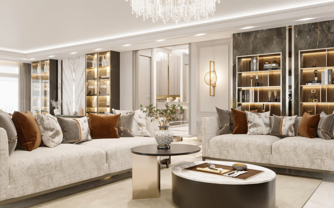 This Mayfair Penthouse living room epitomizes refined elegance and warmth. Plush, textured sofas are adorned with an array of cushions in earthy tones, featuring luxurious fabrics and sophisticated patterns.